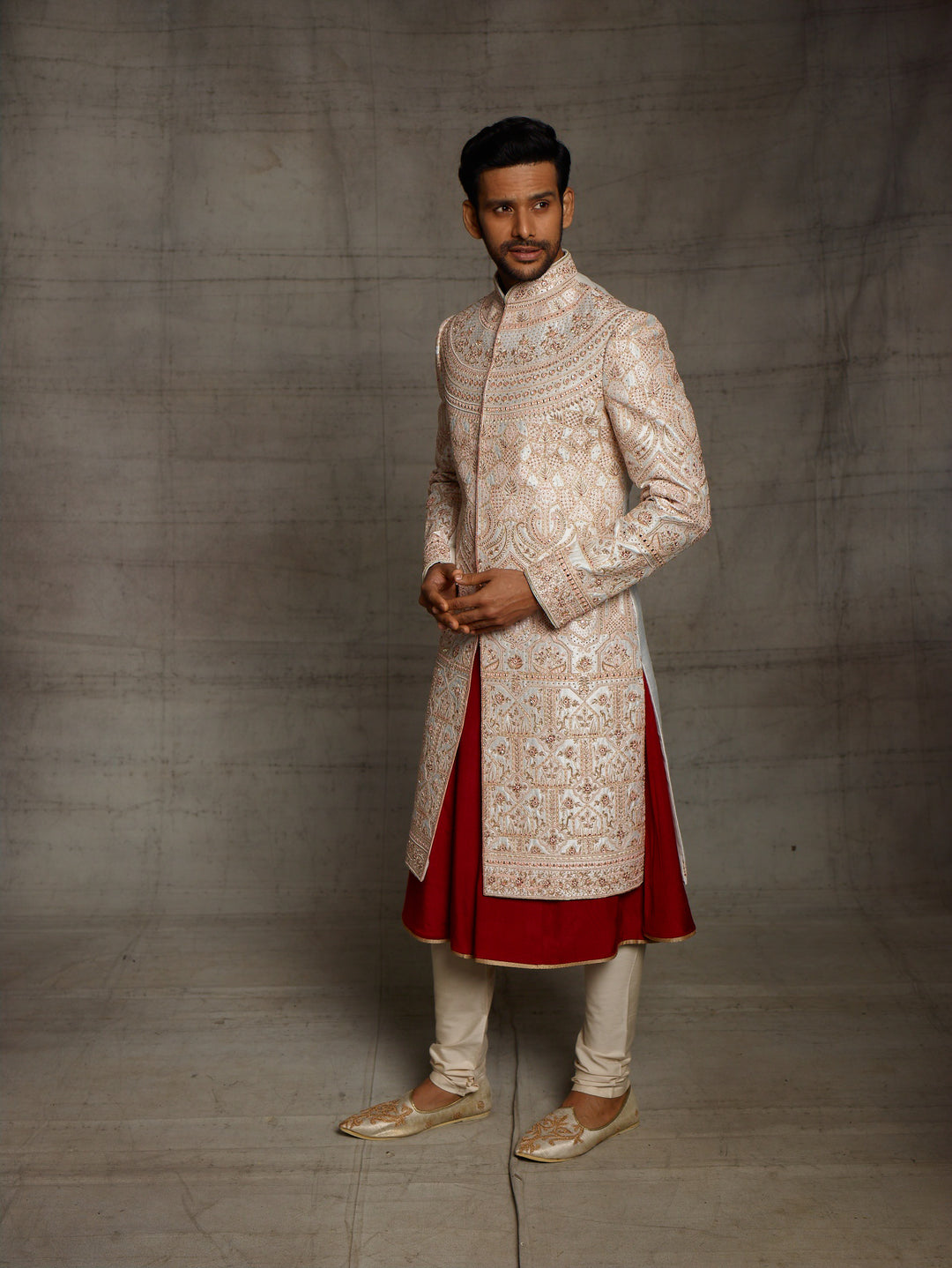 Off-white sherwani with rose gold thread embroidery