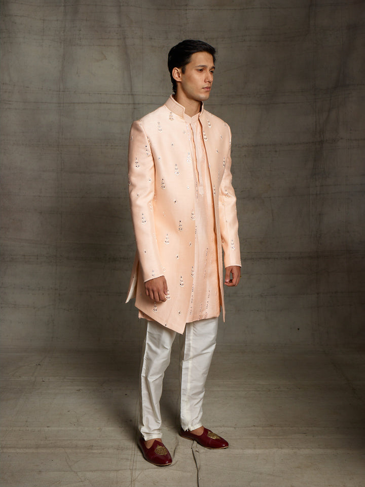 Jacket style indo-western in peach color.