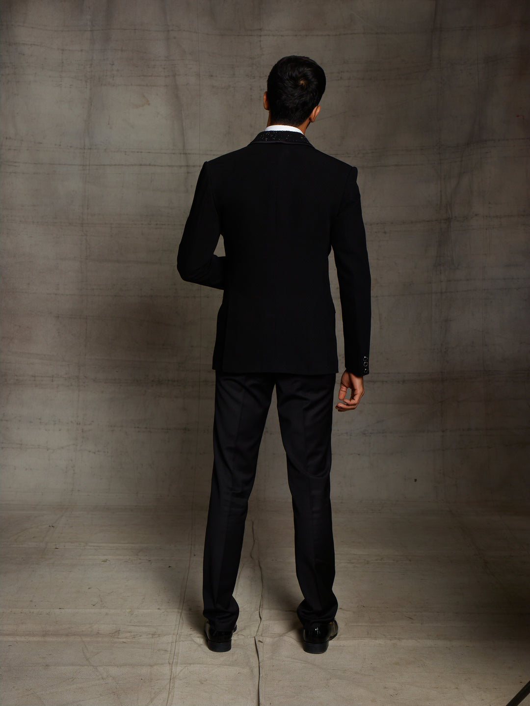 Black suit with textured fabric